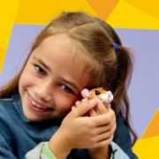 Obrázek Roztomilý křeček s květinou