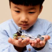 Obrázek Mandalorian a Grogu a spídrová motorka